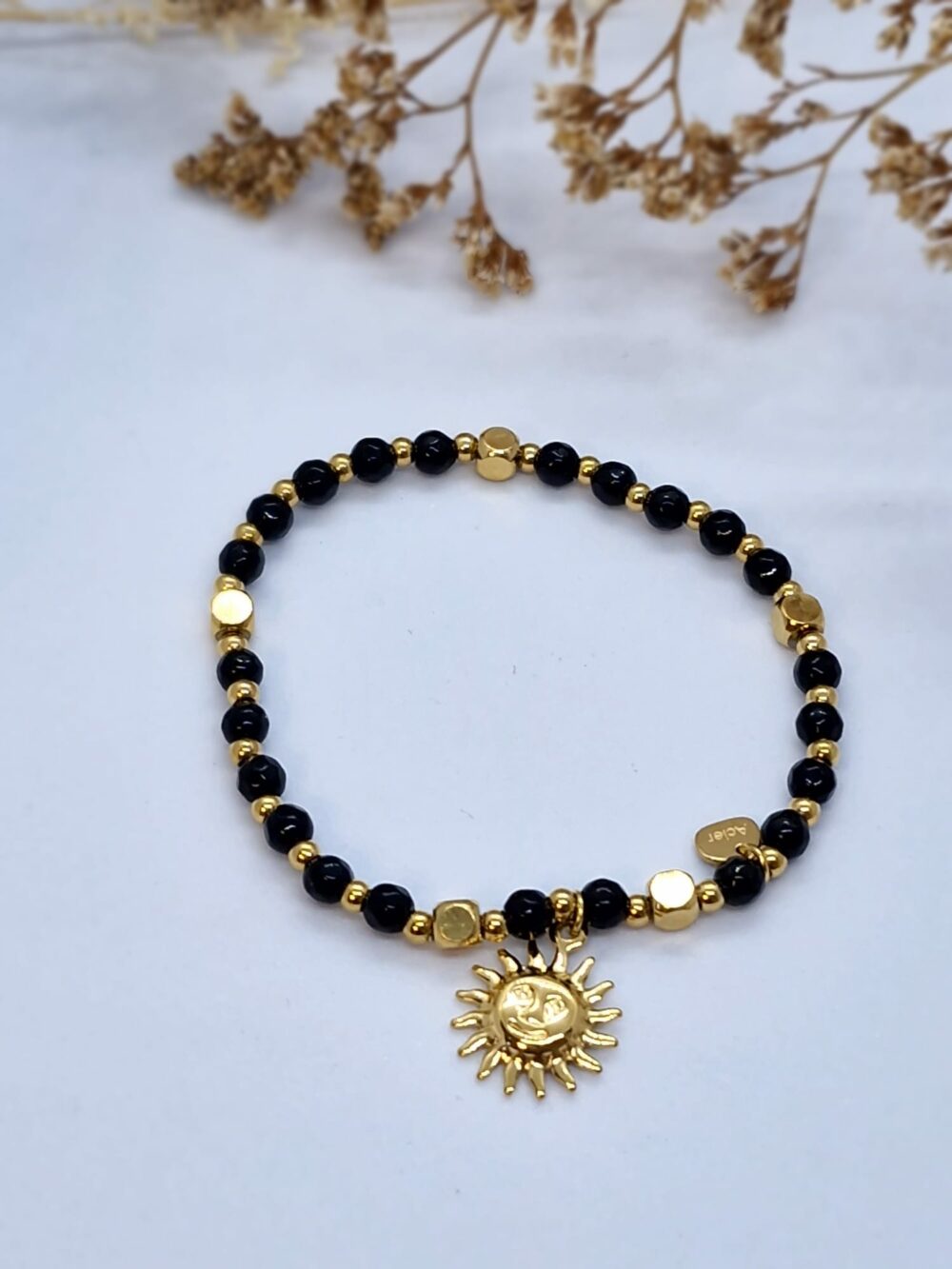 bracelet perle noire et dorée